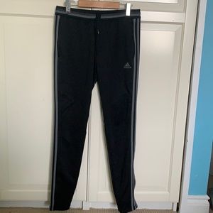 Black and grey adidas joggers